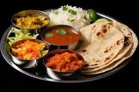Homemade thali with chapati, rice, sabzi — Ghar ka swaad, Nagpur